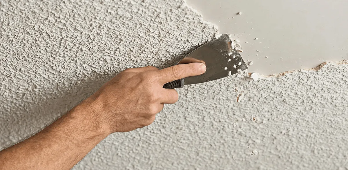 Popcorn ceiling removal scraping off textured ceiling finish in Chandler, AZ