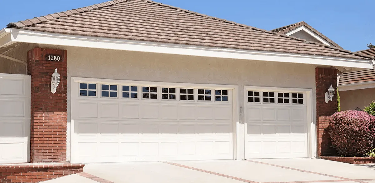 Residential garage door repair service for a double garage door in Chandler, AZ
